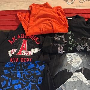 Men’s T-Shirt - Black with Red and Blue Graphics. $10 a piece or all for $40